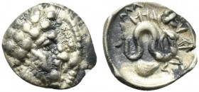 Campania, Allifae, Obol, ca. 325-275 BC; AR (g 0,63; mm 11; h 6); Laureate head of Apollo r.; around, three dolphins, Rv. AΛΛIBANON, Skylla swimming r...