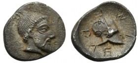 Sicily, Himera, Litra, ca. 475-450 BC; AR (g 0,73; mm 10; h 8); Bearded head r. Rv. Corinthian helmet; around, EIMEPA (retrograde), all within circula...