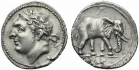 The Carthaginians in the Mediterranean, Sicily, Akragas, Half Shekel, ca. 213-210 BC; AR (g 2,93; mm 18; h 12); Laureate head of Melkart, with feature...