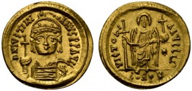 Justinian I (527-565), Solidus, Carthage, AD 546-547; AV (g 4,47; mm 20; h 5); Helmeted and cuirassed facing bust, holding globus cruciger, shield ove...