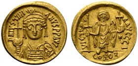 Justinian I (527-565), Solidus, Carthage, AD 546-547; AV (g 4,48; mm 18; h 6); Helmeted and cuirassed facing bust, holding globus cruciger, shield ove...