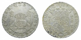 Carlos III (1759-1788). 1769 JR. 8 reales. Potosí. Columnario. (AC 1165). 9 Curvo. Oxidaciones marinas. 26,12 gr. Ag.
mbc