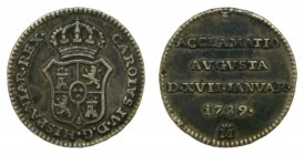 Carlos IV (1788-1808). 1789. Medalla de proclamación. Madrid. Módulo de medio real. 1,47 gr. Ag. (Cy13214).
mbc