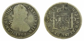 Carlos IV (1788-1808). 1798 PP. 2 reales. Potosí. (AC 665). 6,55 gr. Ag. Hojita en reverso.
bc