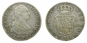 Carlos IV (1788-1808). 1792 MF. 4 reales. Madrid. (AC 778). 13,41 gr. Ag. Rayitas en anverso.
bc+