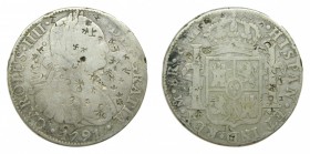 Carlos IV (1788-1808). 1791 FM. 8 reales. México. (AC 953). 26,28 gr. Ag. Resellos chinos. Busto propio.
bc+