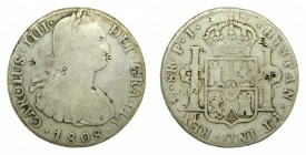 Carlos IV (1788-1808). 1808 PJ. 8 reales. Potosí. (AC 1014). 26,75 gr. Ag. Resellos chinos.
bc+