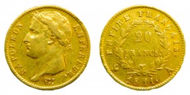 Francia. 20 francos. 1811 A. París. Napoleón I. (KM#695.1). 6,44 gr. Au. Golpecitos.
bc+