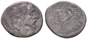 ROMANE REPUBBLICANE - HOSTILIA - L. Hostilius Saserna (48 a.C.) - Denario - Testa maschile a d.; dietro, uno scudo /R Guerriero armato su biga a d. B....