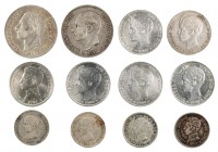 1879 a 1904. 50 céntimos (cuatro), 1 (seis) y 2 (dos) pesetas. Lote de 12 monedas. A examinar. BC/MBC+.