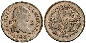 1788/9. Carlos III. Segovia. 2 maravedís. (AC. 50, mismo ejemplar). 2,39 g. Rectificación muy rara. Bella. Brillo original. En cápsula de la NGC como ...