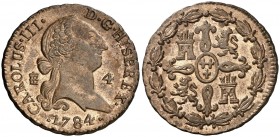 1784. Carlos III. Segovia. 4 maravedís. (AC. 63). 5,45 g. Pátina. Muy bella. Brillo original. En cápsula de la NGC como MS64 RB, nº 2648367-017. Ex Co...