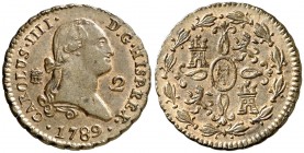 1789. Carlos IV. Segovia. 2 maravedís. (AC. 25). 2,57 g. Muy bella. Brillo original. En cápsula de la NGC como MS63 BN, nº 2800890-002. Ex Colección I...