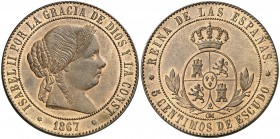 1867. Isabel II. Sevilla. OM. 5 céntimos de escudo. (AC. 261, mismo ejemplar). 12,78 g. ¿Prueba? Bellísima. Brillo original. En cápsula de la NGC como...