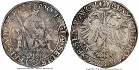 Aachen. Free City Taler 1570 XF40 NGC, Dav-8902. With the name and titles of Maximilian II. Enthroned Charlemagne facing / Crowned Imperial eagle. 
...