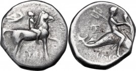 Greek Italy. Southern Apulia, Tarentum. AR Nomos, c. 272-240 BC. Youth on horseback right, crowned by Nike flying right; [ΣΥ before; magistrates's sig...
