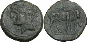 Punic Sardinia. Uncertain mint. AE 18.5 mm. Second Punic War, c. 220-215 BC. Head of Tanit left, wearing grain wreath; punic letter to lower left. / B...