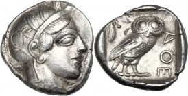 Continental Greece. Attica, Athens. AR Tetradrachm, c. 454-404 BC. Helmeted head of Athena right, with frontal eye. / AΘE. Owl standing right, head fa...