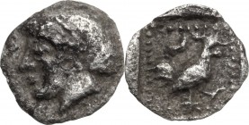 Greek Asia. Lesbos, Methymna. AR Tetartemorion, c. 500-460 BC. Female head left, hair bound in sakkos. / Cock advancing right, crescent above; all in ...
