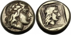 Greek Asia. Lesbos, Mytilene. EL Hekte, c. 412-378 BC. Laureate head of Apollo right. / Female head with long flowing hair right, within linear frame;...