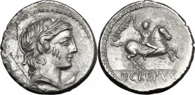 Pub. Crepusius. AR Denarius, 82 BC. Laureate head of Apollo right, sceptre over shoulder; below chin, crown. / Horseman galloping right hurling spear;...