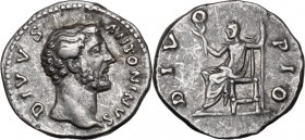 Divus Antoninus Pius (died 161). AR Denarius, struck under Marcus Aurelius. DIVVS ANTONINVS. Bare head right. / DIVO PIO. Antoninus seated left, holdi...