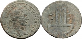 Caracalla (198-217). AE 32 mm. Paphos mint, Cyprus. Koinon of Cyprus. M ANTΩNЄINOC AVΓOVCTOC. Laureate head right. / KOINON KVΠPIΩN. Conical cult 'xoa...