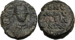 Ostrogothic Italy, Baduila (541-552). AE Decanummium, Rome mint, 549-552 AD. dN BAD[V IL A REX]. Crowned and draped bust facing. / DN B/ ADV/ ILA/ REX...