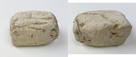 Leads from Ancient World. Punic Sardinia. Lead weight, VII-V century BC. On upper face, graffiti (marks of value?). PB. 411.90 g. RR. mm. 54x33x35. Ve...