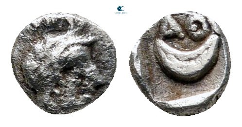 Attica. Athens circa 400-353 BC. 
Tetartemorion AR

4 mm, 0,16 g

Helmeted ...