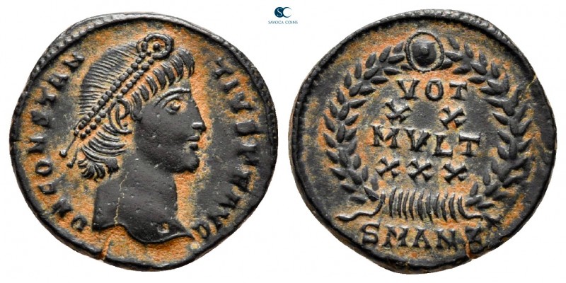 Constantius II, as Caesar AD 324-337. Antioch
Nummus Æ

14 mm, 1,85 g

D N ...