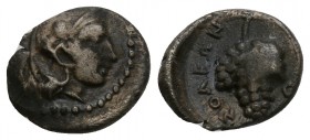 Greek, Cilicia, c. 350-330 BC, AR Obol, Soloi
Obverse: Head of Athena right, in crested Corinthian helmet
Reverse: ΣOΛEΩN, bunch of grapes, with ten...