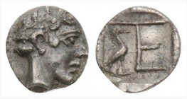 Ionia. Kolophon circa 450-410 BC. 
Tetartemorion AR, Laureate head of Apollo right / TE monogram, stork standing right, at left, all within incuse sq...