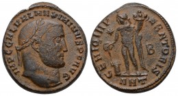 Maximinus II Æ Nummus. Antioch, AD 310-311. 
IMP C GAL VAL MAXIMIANVS P F AVG, laureate head right / GENIO IMPERATORIS, Genius standing facing, head ...