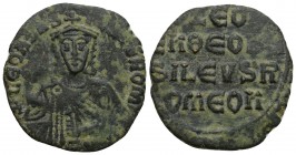 Leo VI the Wise. AD 886-912. 
Constantinople, Follis Æ
Obv: + LEON bASILEVS ROM star, Leo, crowned and wearing loros, seated facing on lyre-backed t...