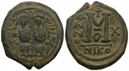 Justin II Æ 40 Nummi. Eastern military mint, year 10 = AD 574/5. Justin and Sophia enthroned facing / Large M between ANNO and X, cross above, officin...