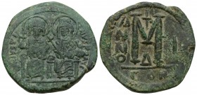 Justin II (565-578 AD).
Follis (40 Nummi). 565 - 566 AD Constantinopolis.
Vs: Justinus with globe cross and Sophia enthroned with cross scepter en f...