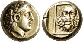 LESBOS. Mytilene. Circa 377-326 BC. Hekte (Electrum, 10 mm, 2.57 g, 11 h). Head of Dionysos to right, wearing wreath of ivy and fruit. Rev. Bald facin...