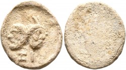 ASIA MINOR. Uncertain. Tessera (Lead, 17 mm, 3.29 g), Axy..., circa 3rd century AD. [A]ΞI Composite head of Silenos on the left and horned youthful Pa...