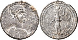 ASIA MINOR. Uncertain. Amulet (Lead, 25 mm, 5.92 g, 12 h), circa 3rd-5th centuries. Helmeted and cuirassed bust to the right, holding spear and shield...