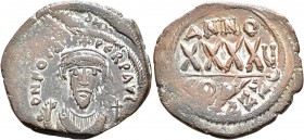 Phocas, 602-610. Follis (Bronze, 33 mm, 11.69 g, 1 h), Constantinopolis. δ N FOCAS PERP Crowned bust of Phocas facing, wearing consular robes, holding...