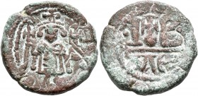Constans II, 641-668. 12 Nummi (Bronze, 22 mm, 7.70 g, 7 h), Alexandria, September-November 641 or late 645-May 646. Constans II standing facing, wear...