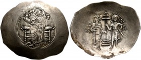 John II Comnenus, 1118-1143. Aspron Trachy (Electrum, 33 mm, 4.10 g, 6 h), Constantinopolis. Christ seated facing on throne without back, wearing pall...