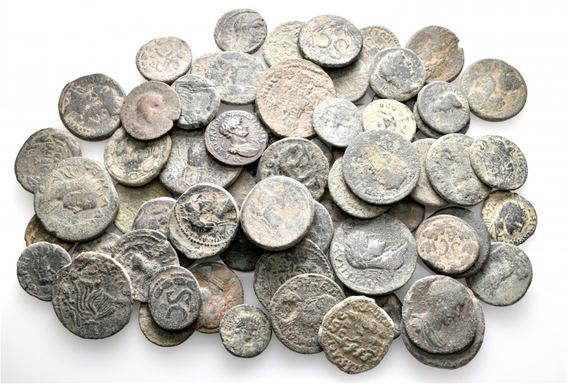 A lot containing 72 bronze coins. All: Roman Provincial. About fine to about ver...