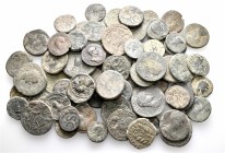 A lot containing 72 bronze coins. All: Roman Provincial. About fine to about very fine. LOT SOLD AS IS, NO RETURNS. 72 coins in lot.