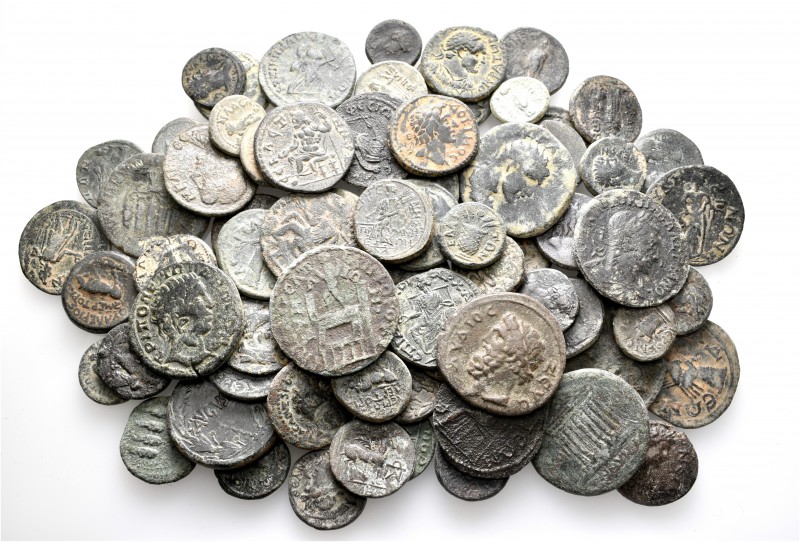 A lot containing 79 bronze coins. All: Roman Provincial. Fine to about very fine...