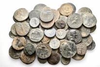 A lot containing 58 bronze coins. All: Roman Provincial. Fine to very fine. LOT SOLD AS IS, NO RETURNS. 58 coins in lot.