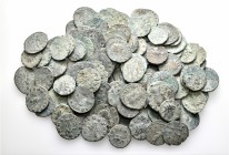 A lot containing 103 bronze coins. Includes: Roman Imperial. Fair to fine. LOT SOLD AS IS, NO RETURNS. 103 coins in lot.