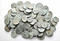 A lot containing 105 bronze coins. Includes: Roman Imperial. Fair to fine. LOT SOLD AS IS, NO RETURNS. 105 coins in lot.