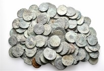 A lot containing 107 bronze coins. Includes: Roman Imperial. Fair to fine. LOT SOLD AS IS, NO RETURNS. 107 coins in lot.